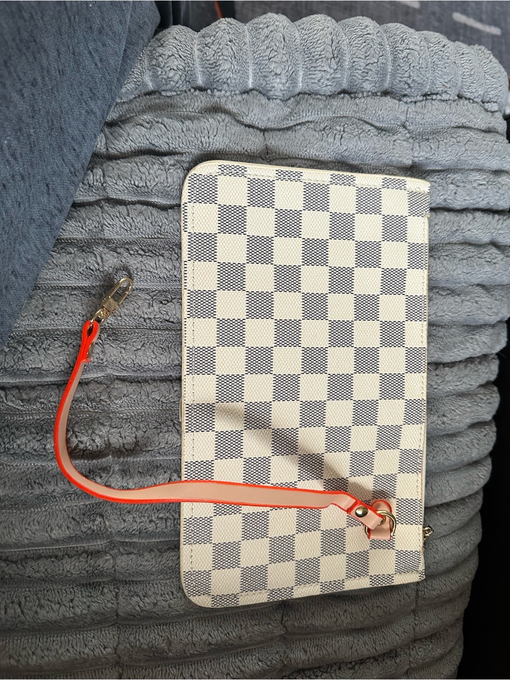Checker-Pattern Wristlet Clutch with Orange Strap